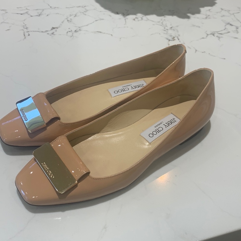 Jimmy Choo flat pumps in neutral color. Gently worn.